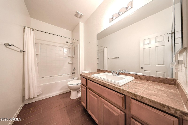 DOWNSTAIRS FULL BATHROOM ATTACHED TO BED