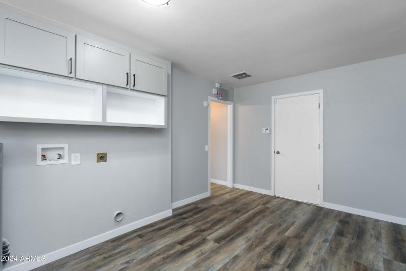 Functional Laundry Room Custom Cabinets