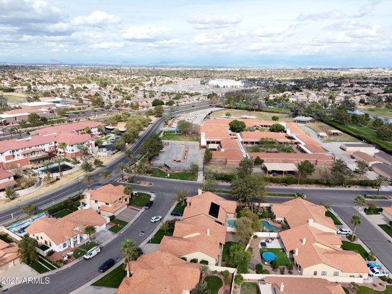 DRONE SHOT OF SCHOOL ACROSS STREET
