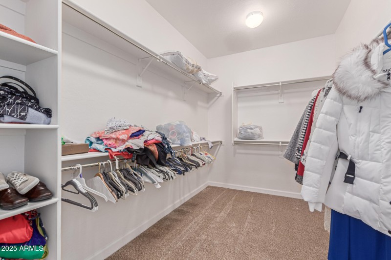 Huge walk in Primary closet