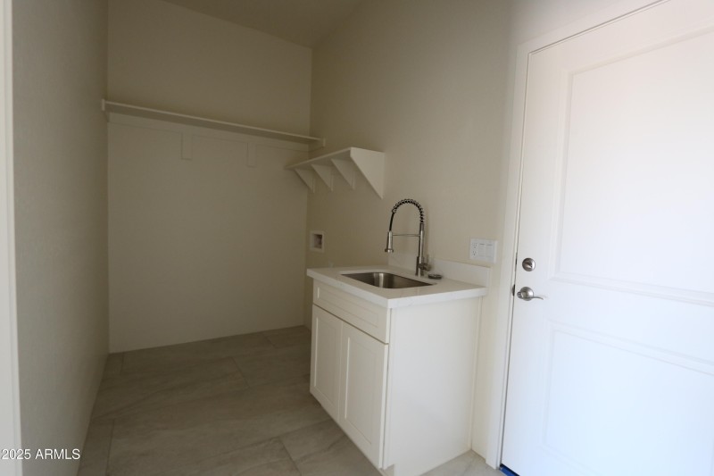 Laundry room with sink