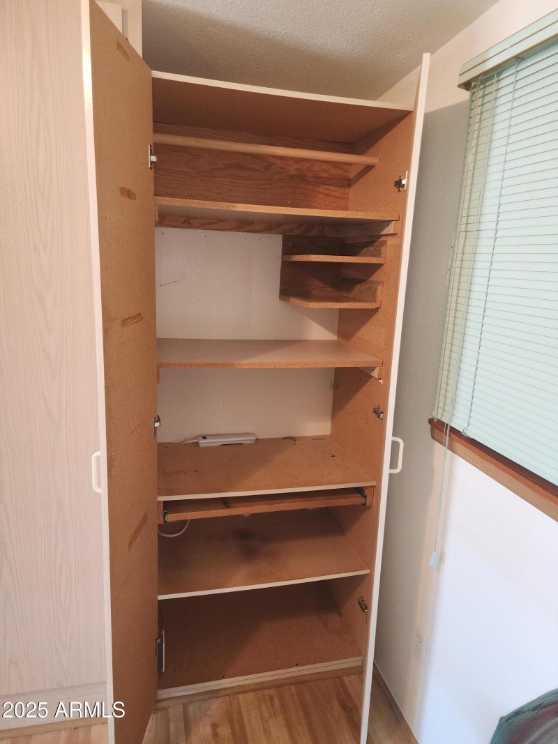 53 A closet next to Murphey bed.