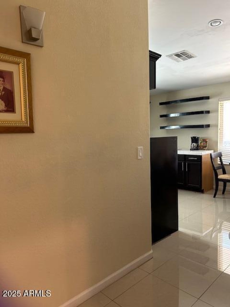 Flex hallway to open kitchen with breakf