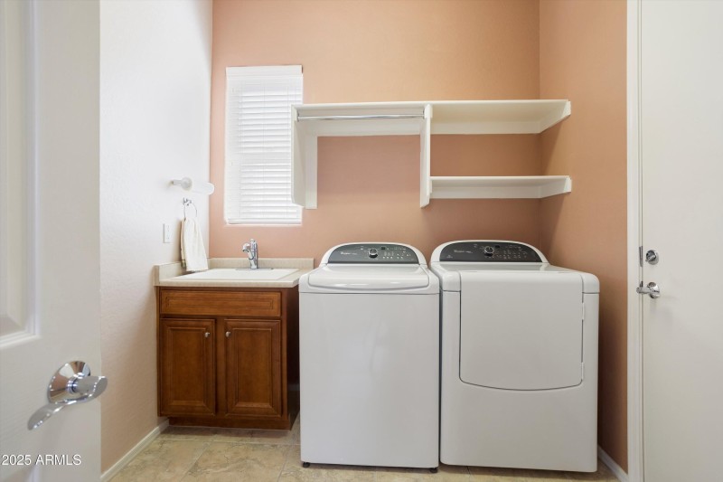 LAUNDRY ROOM WITH SINK.
