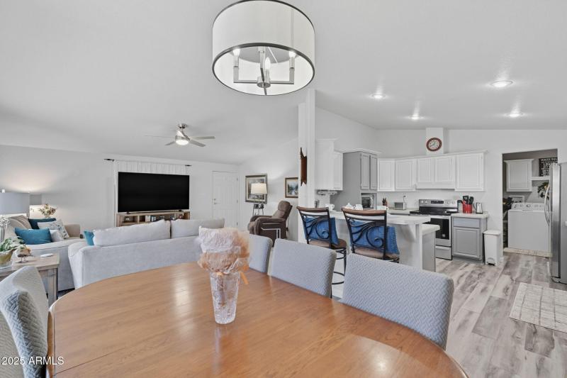 Dining area view into kitchen/living rm