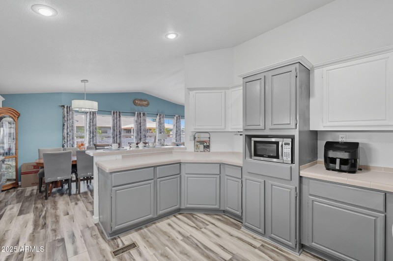 Kitchen view into dining area
