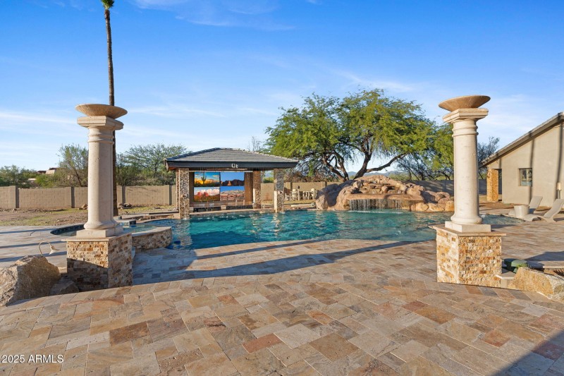 pool and spa with pavers