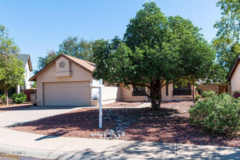 10345 n 62nd ave front of home