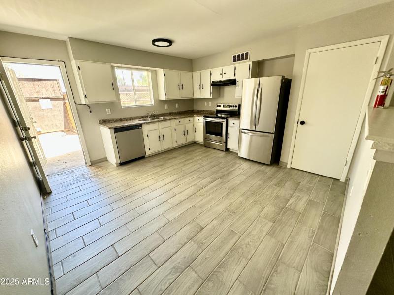 Kitchen and view to backyard