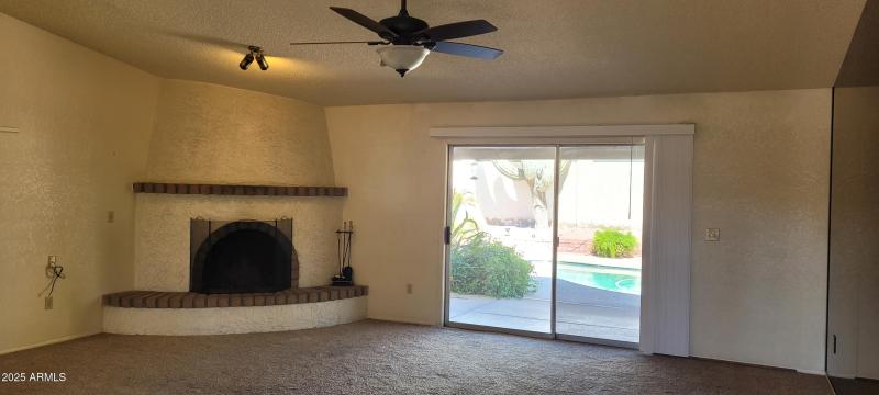Living Room with a Kiva Fireplace