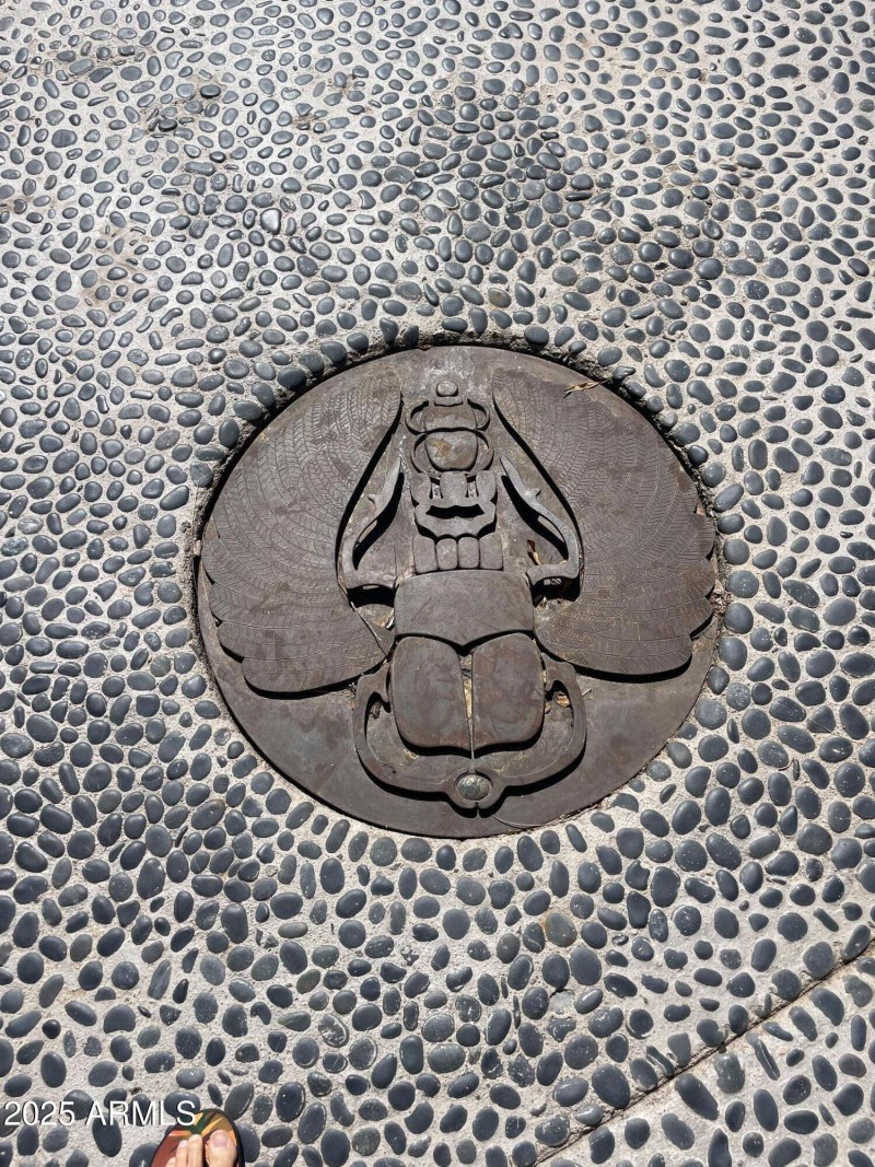 Metal Scarab in courtyard