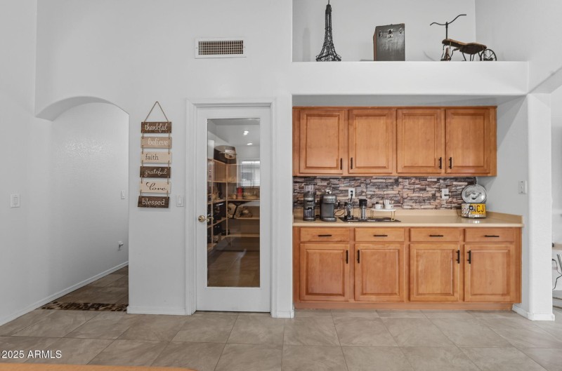 9637 E. Olla Ave.
