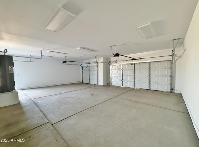 3 Car garage w/openers