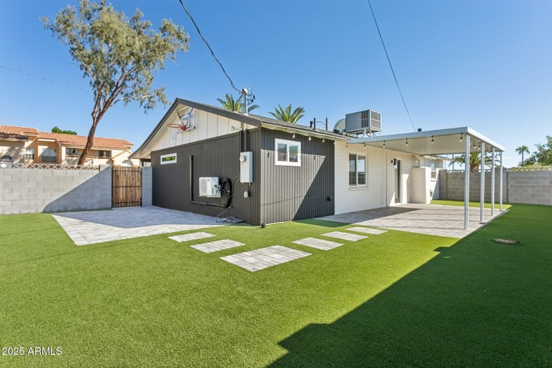 Paver patios and paths in rear yard