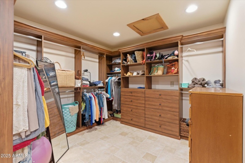 Huge walk-in primary suite closet