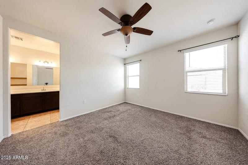 Primary Bedroom w ceiling fan