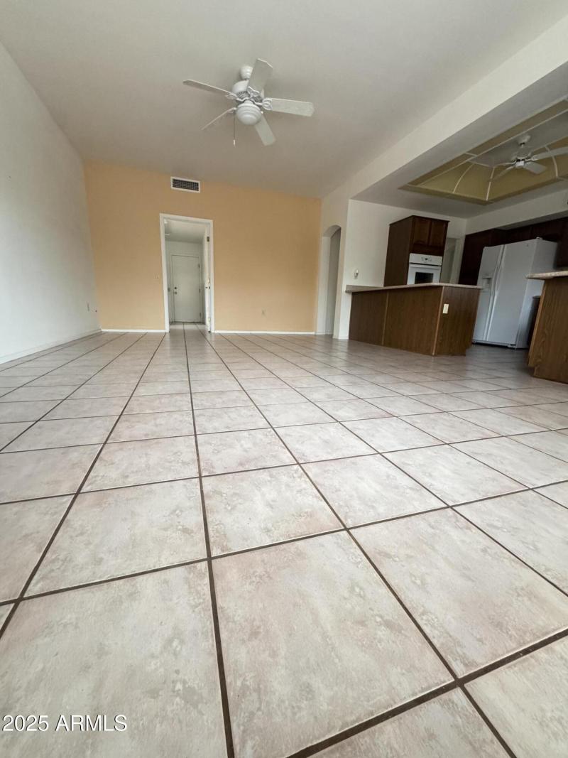 family room area entry to inside laundry
