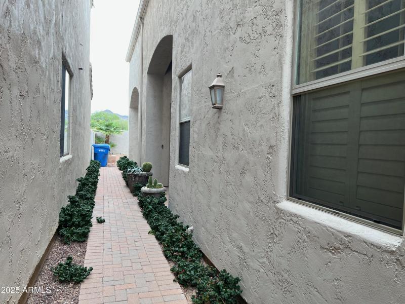 Walkway to front door and backyard