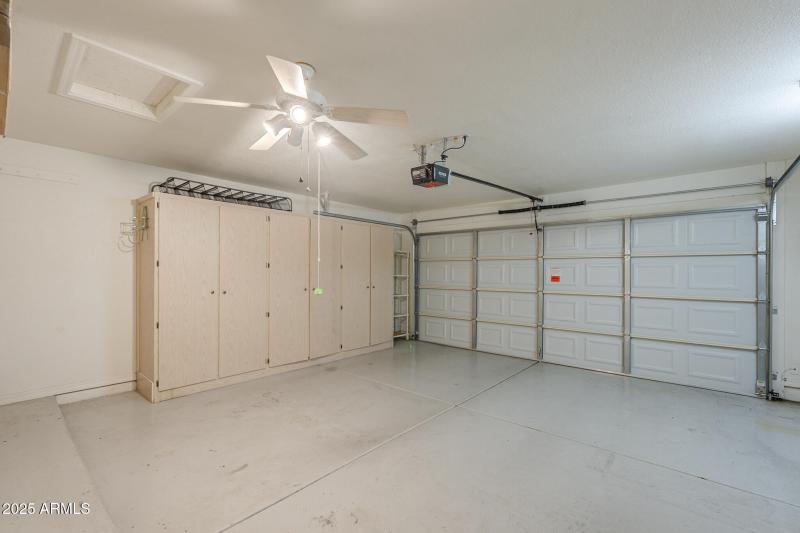 2 car garage with built in cabinets