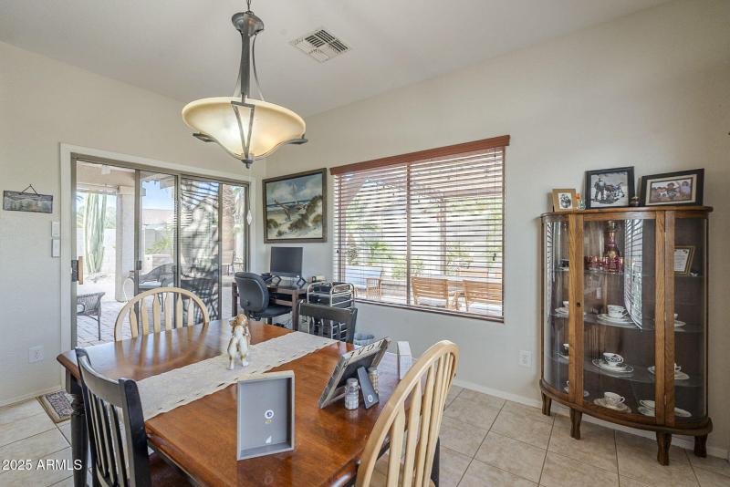 Eat-in kitchen view to backyard