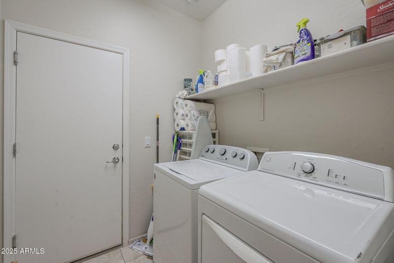 Laundry room with additional storage