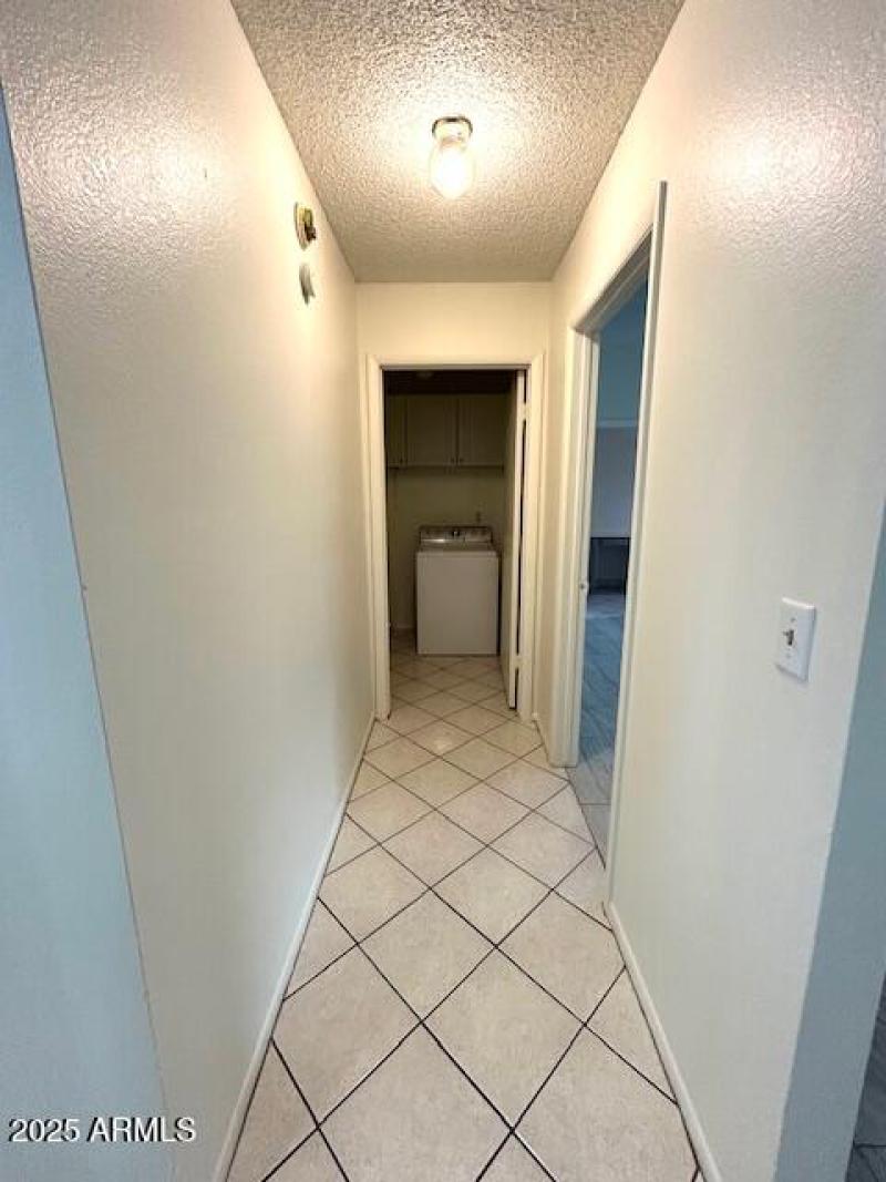 Hallway to Master Bedroom and Laundry