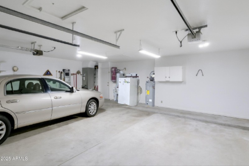 Super wide 3-car garage with 2 electric