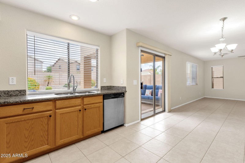 Kitchen with large view window to connec