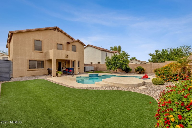 New turf, sparking pool, large backyard