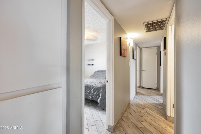 Hallway to bath and bedrooms