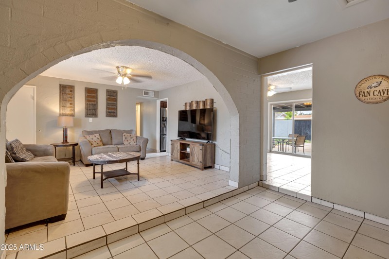 Living room and bonus room/office/den