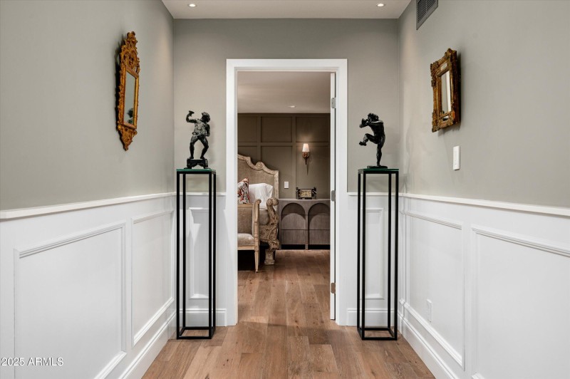 Wide Hallways Lead to Primary Suite