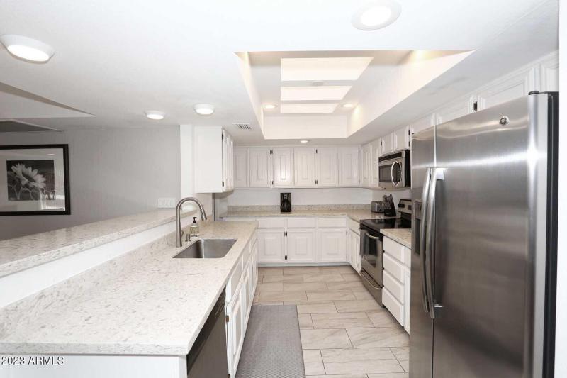 Kitchen opens to Family Room