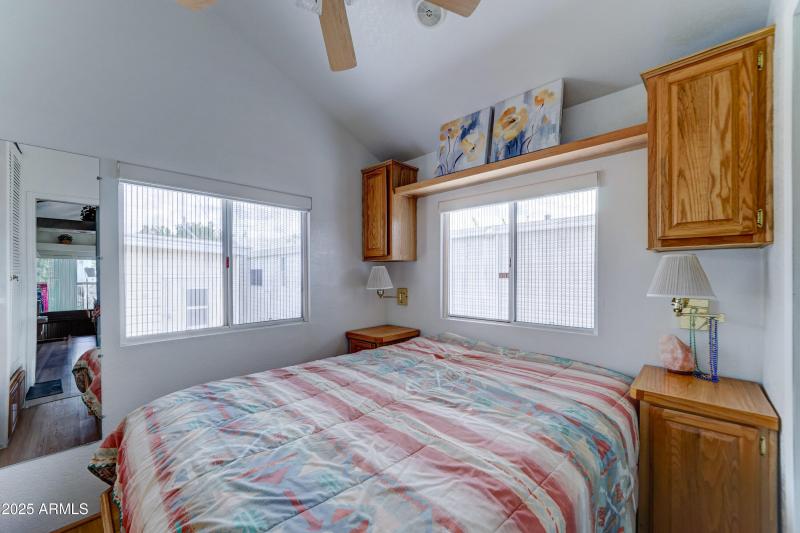 Sunny bedroom with lots of storage