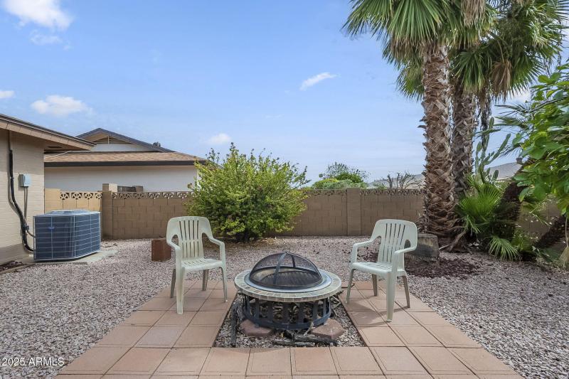 Sout-Facing Backyard with Firepit Area