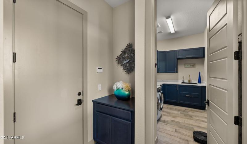 48-web-or-mls-Garage Door and Laundry Ro