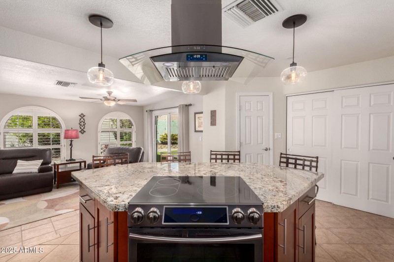 Island Cooktop and Dual Pantries