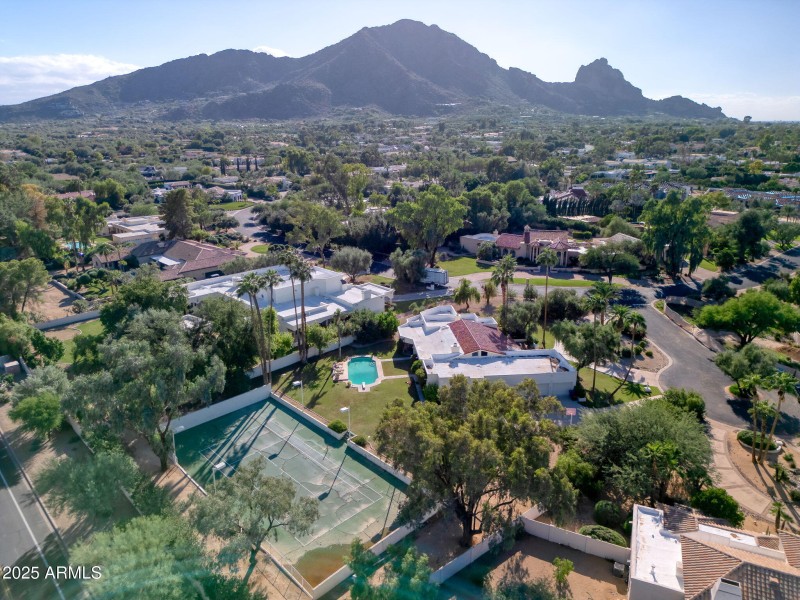 Tennis court and swimming pool.