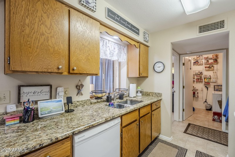 Kitchen with Laundry Rm in Background