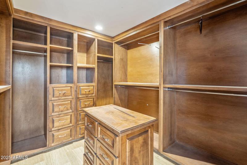 Closet in primary bedroom