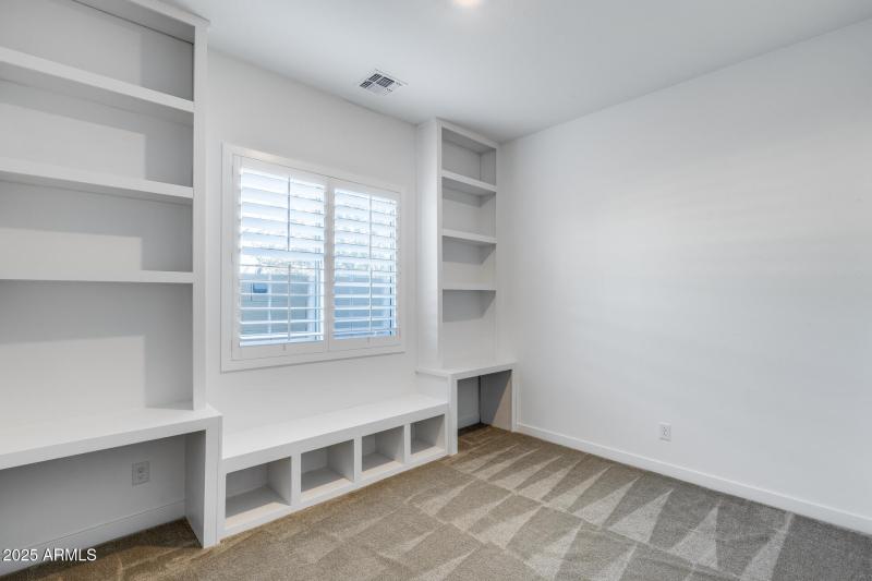Guest Bedroom #2 with custom built ins