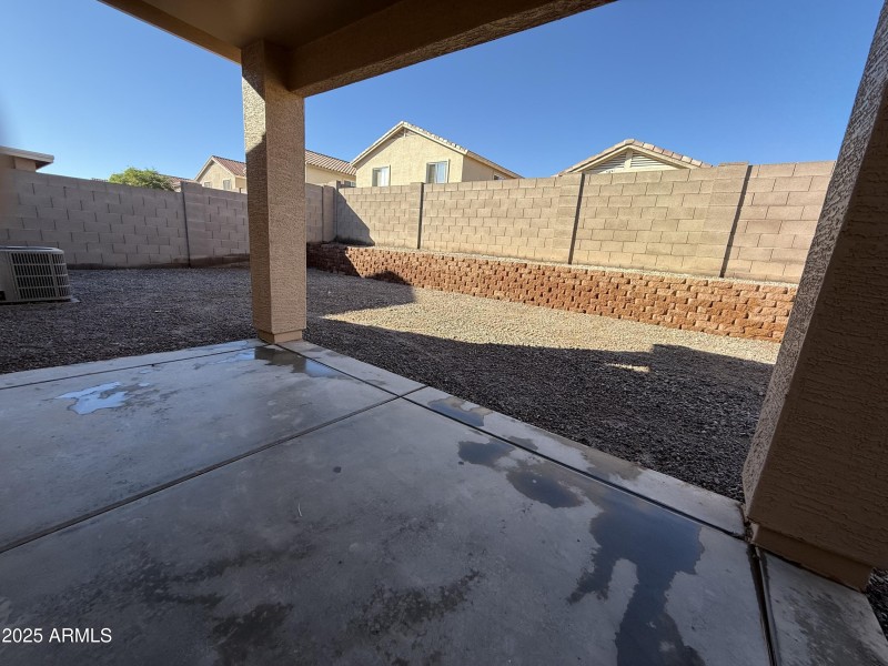 Large flat gravel backyard
