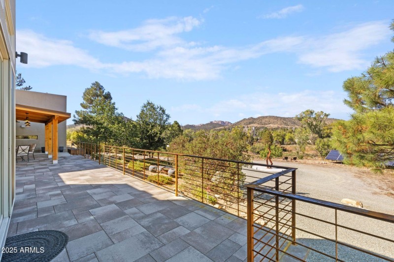 NO STEPS OUT TO PAVER PATIO