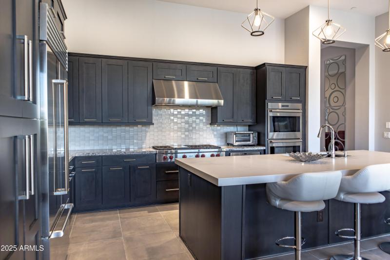 Kitchen tile backsplash and range