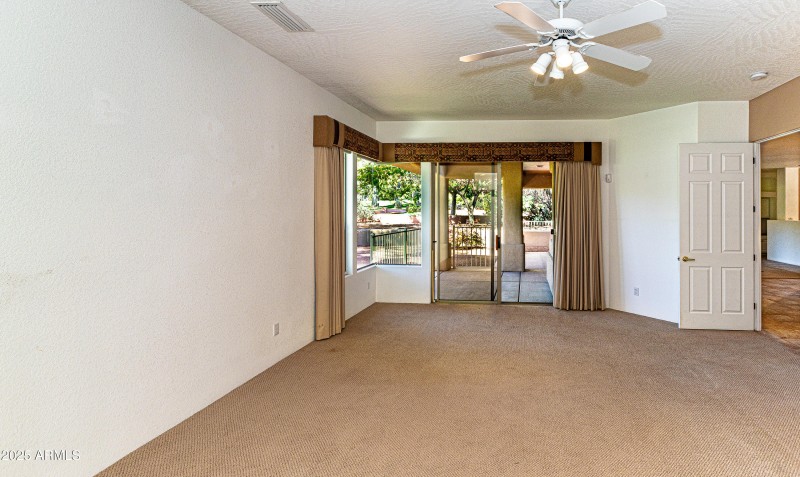 11 Primary with Slider to Covered Patio