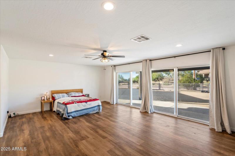 Primary Bedroom w/ Sliders to Patio