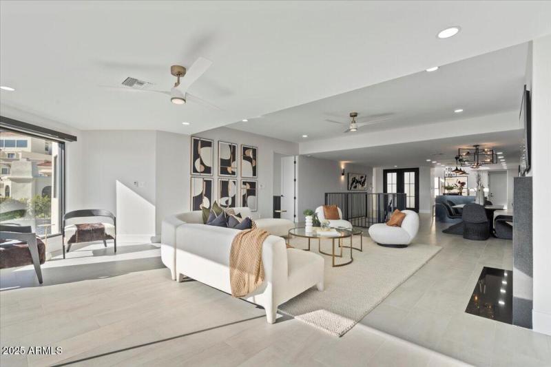 LIVING ROOM TOWARD FRONT ENTRY