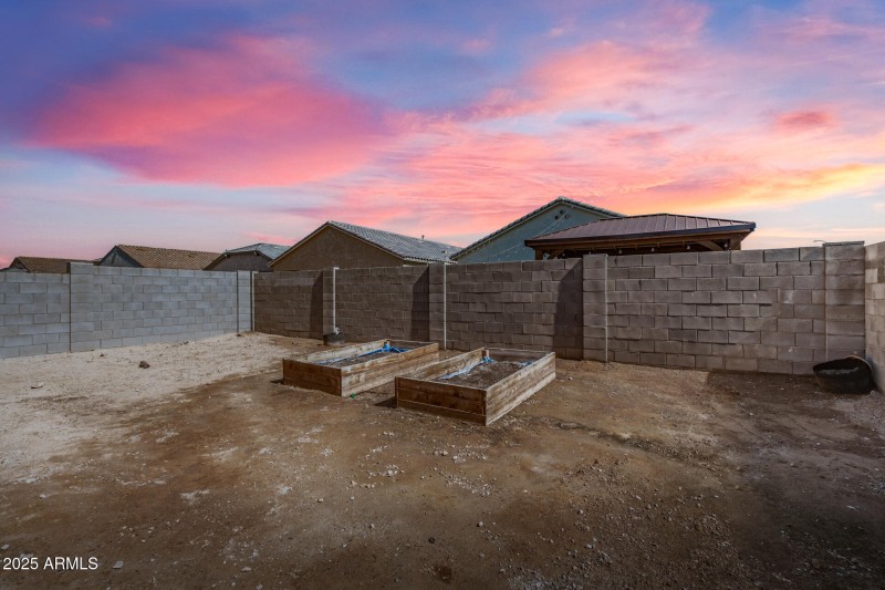 ENJOY BACKYARD SUNSETS FROM YOUR PATIO