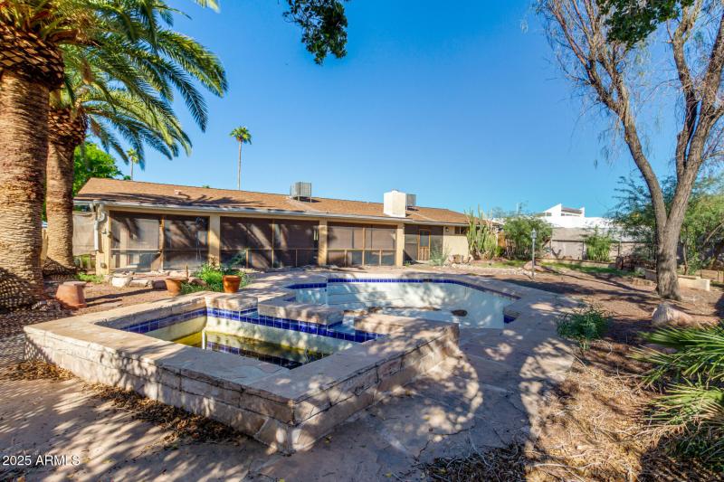 View of Spa/Pool/Back of Home