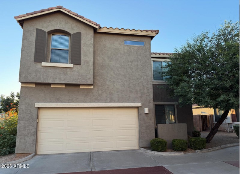 996 E Cantebria Dr Exterior Garage Side
